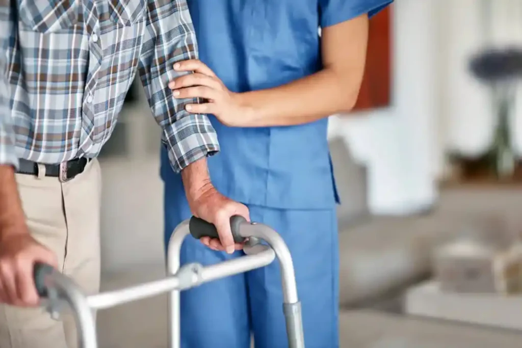 My Lotus NDIS services Gold Coast – care worker with qualifications and training assisting senior with Daily Living Support.